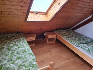 Letto o letti in una camera di U Lojzika