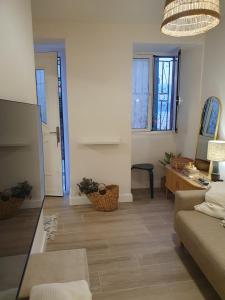 a living room with a couch and a table at Casita en Fontán in Sada