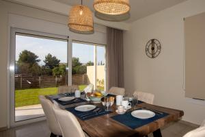 Φωτογραφία από το άλμπουμ του Sanctuary Beach Villas by "Elite" στον Αλυκανά +53 φωτογραφίες