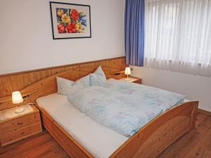 Postel nebo postele na pokoji v ubytování Apartment File by Interhome