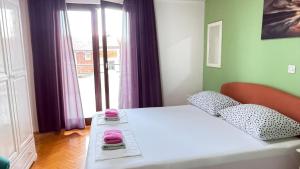 Postel nebo postele na pokoji v ubytování Apartment Kuba Makarska