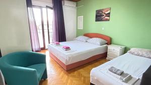 Postel nebo postele na pokoji v ubytování Apartment Kuba Makarska
