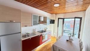Kuchyň nebo kuchyňský kout v ubytování Apartment Kuba Makarska