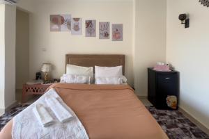 A bed or beds in a room at giza pyramids view Még 22 kép