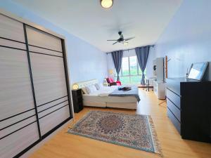 a bedroom with a bed and a large sliding door at PPAM Seruling Presint 5, Putrajaya 4BR with PICC and Garden View, 62200 Putrajaya 
