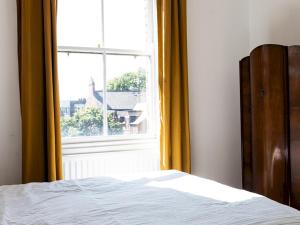 Katil atau katil-katil dalam bilik di Pass the Keys Stylish 2-Bed Flat in the Heart of Jesmond