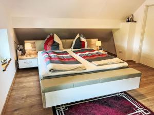 Katil atau katil-katil dalam bilik di Apartment Ferienhuus up Hütten by Interhome