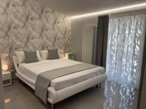 Postel nebo postele na pokoji v ubytování Ranieri Guest House + 28 fotografií