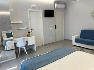 TV a/nebo společenská místnost v ubytování Ranieri Guest House