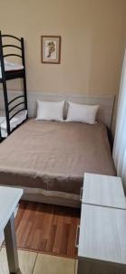 Postel nebo postele na pokoji v ubytování Tulipan Hotel Aquapark