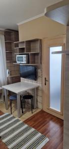 Kuchyň nebo kuchyňský kout v ubytování Tulipan Hotel Aquapark