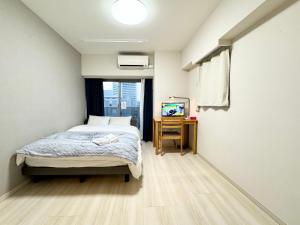 Letto o letti in una camera di Otsuka No3 Mansion #JR Yamanote Line#Fixed Wifi