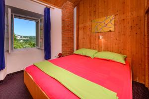 Postel nebo postele na pokoji v ubytování Fisherman's Guest house Galeb