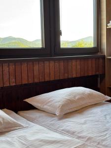 Postel nebo postele na pokoji v ubytování Tulipan Hotel Aquapark