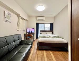 Letto o letti in una camera di Otsuka No3 Mansion #JR Yamanote Line#Fixed Wifi