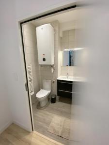 Ένα μπάνιο στο Logement Neuf Cosy avec Espaces Communs Premium 11 +25 φωτογραφίες