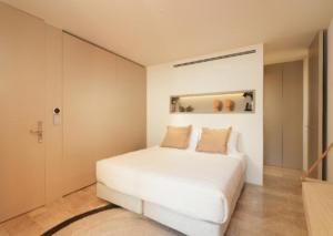 Palmares Signature Apartments客房内的一张或多张床位