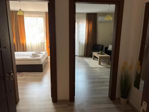 Postel nebo postele na pokoji v ubytování Апартамент Рафаела-Мартина-Регнум + 5 fotografií