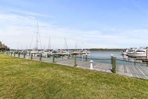 a dock with boats docked in a marina at 1935 Bohicket Marina in Seabrook Island
