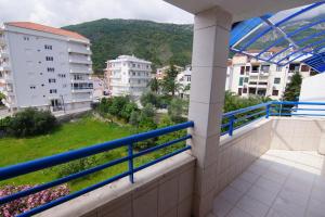 a balcony with a view of a city at Blue Palace Guest House in Budva