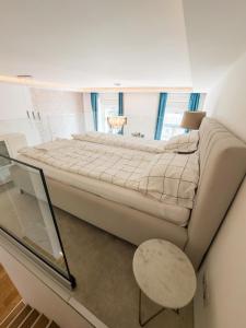 Posteľ alebo postele v izbe v ubytovaní Margaret Bridge Residence