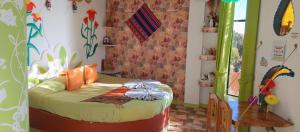 Postel nebo postele na pokoji v ubytování Hostal Piedra Andina + 22 fotografií