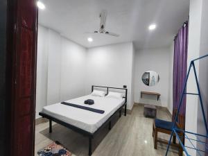 Katil atau katil-katil dalam bilik di Aqualeaf Villa's