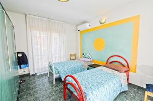 a hospital room with two beds and a window at Hotel Residenza Delle Alpi in Turin +78 photos