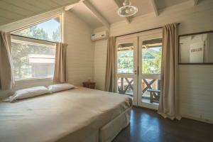 Postel nebo postele na pokoji v ubytování INDÓMITO HOSTEL