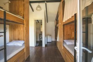 Postel nebo postele na pokoji v ubytování INDÓMITO HOSTEL