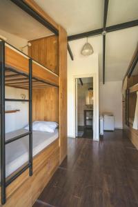Postel nebo postele na pokoji v ubytování INDÓMITO HOSTEL