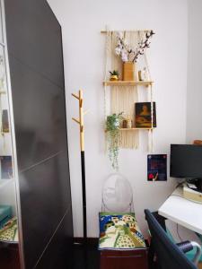 a room with a cross on the wall at Chambres à St Loup-Marseille in Marseille