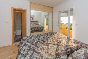 Posteľ alebo postele v izbe v ubytovaní Apartments Max&Leon + 37 fotografií