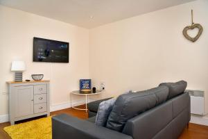 Μια τηλεόραση ή/και κέντρο ψυχαγωγίας στο Seaside Serenity in Swansea