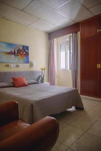 Postel nebo postele na pokoji v ubytování Hotel Paraíso