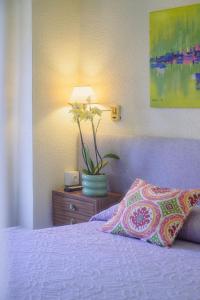 Postel nebo postele na pokoji v ubytování Hotel Paraíso
