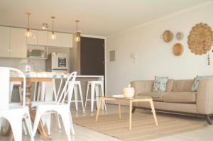 Una cocina o cocineta en Loica Suites