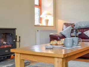 Ruang duduk di Old Mill Cottage