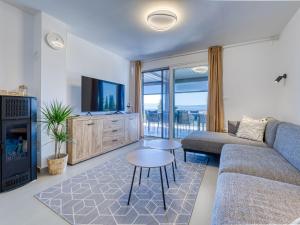 Μια τηλεόραση ή/και κέντρο ψυχαγωγίας στο Holiday Home Perla by Interhome