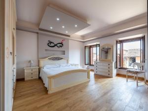 Postel nebo postele na pokoji v ubytování Apartment Il Borghetto-1 by Interhome