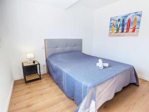 Ένα ή περισσότερα κρεβάτια σε δωμάτιο στο Holiday Home Les Cariatides 5 by Interhome