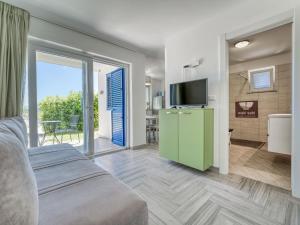 Μια τηλεόραση ή/και κέντρο ψυχαγωγίας στο Apartment Terra by Interhome