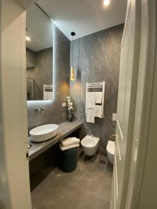 Koupelna v ubytování Unicum Trastevere Suites
