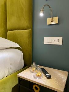 Postel nebo postele na pokoji v ubytování Unicum Trastevere Suites