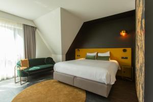 Krevet ili kreveti u jedinici u okviru objekta Ariane Hotel