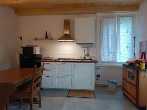 Kuchyň nebo kuchyňský kout v ubytování Baita al Sole + 39 fotografií