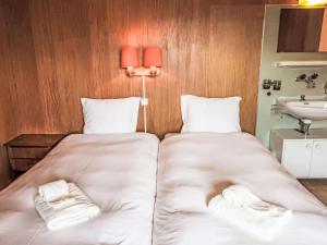 Ένα ή περισσότερα κρεβάτια σε δωμάτιο στο Chalet Chalet L'Etape by Interhome