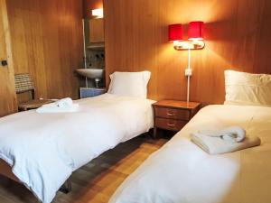 Ένα ή περισσότερα κρεβάτια σε δωμάτιο στο Chalet Chalet L'Etape by Interhome +19 φωτογραφίες