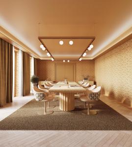 a conference room with a table and chairs at The Florentin by Althoff Collection in Frankfurt/Main