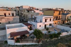 an aerial view of a city with buildings at Baia Marina Oasi in Balestrate